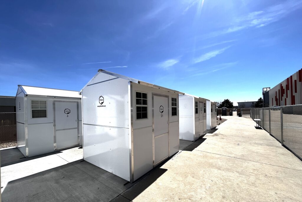 Two rows of Pallet shelters at Aurora Safe Outdoor Space in Colorado.