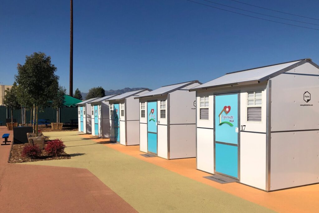 Row of four Pallet shelters at Esperanza Villa