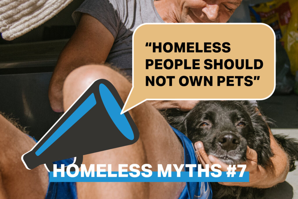 Pallet shelter village resident John is shown seated with his dog Walter. Text reads: Homeless Myths #7 Homeless people should not own pets