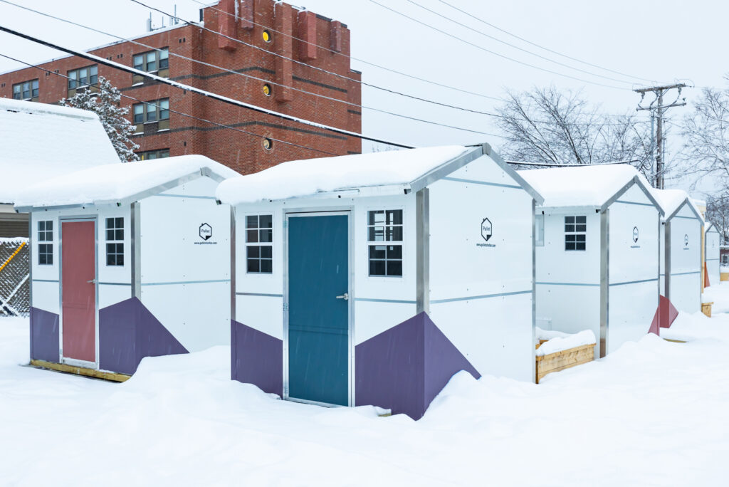 Pallet shelter village in snowy conditions